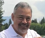A headshot of Rafael Flores